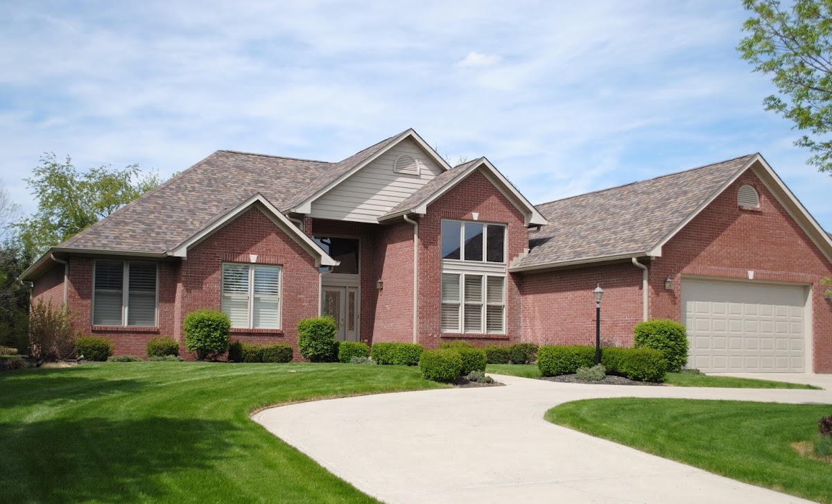 Completed brick home with new roof