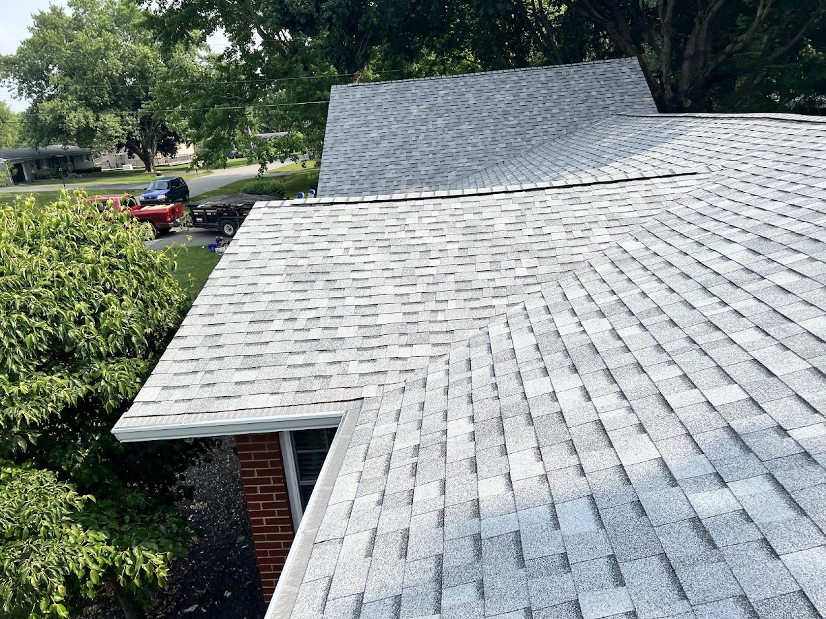 Freshly installed architectural shingles on a roof